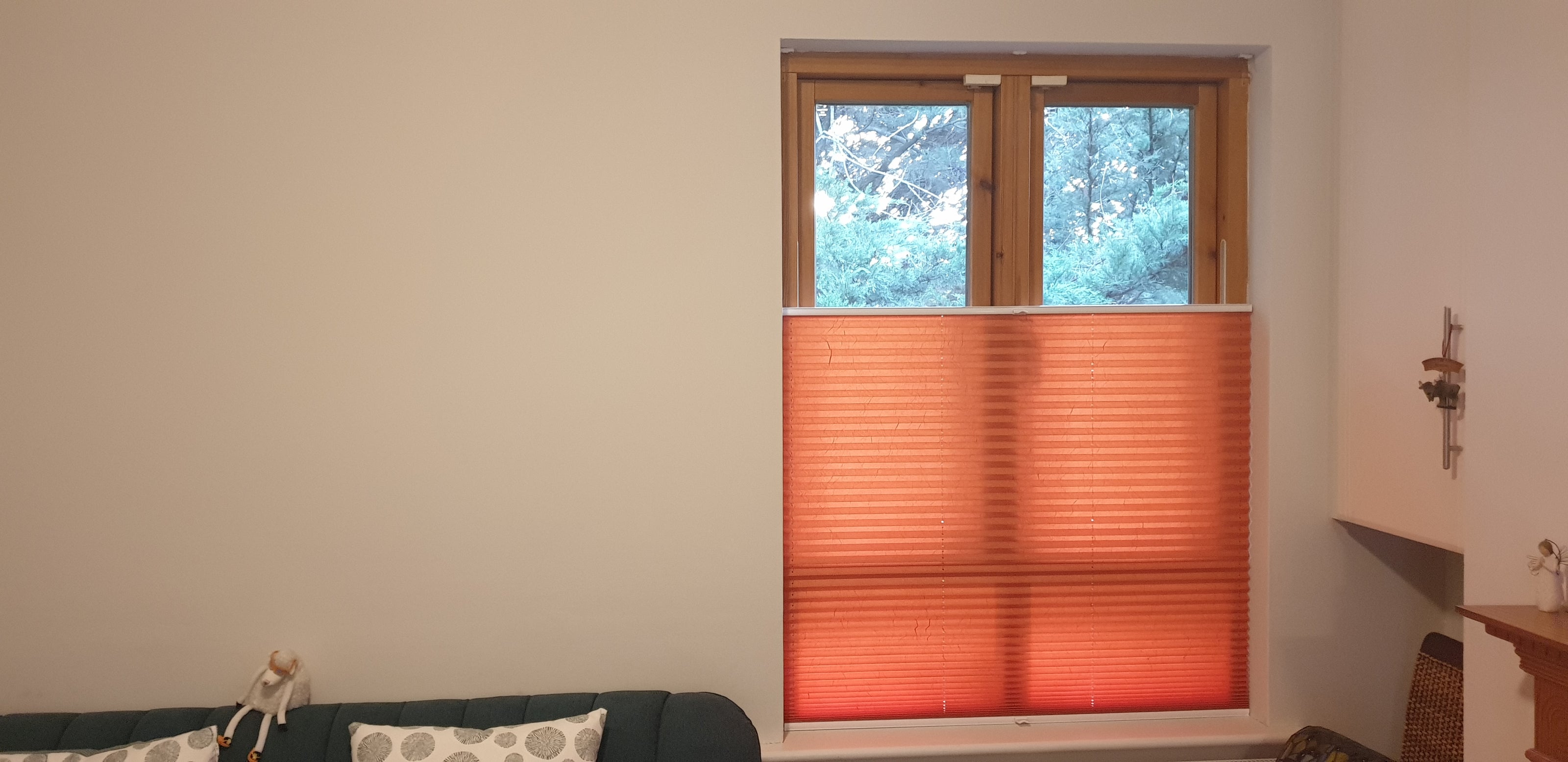 Top down bottom up Orange pleated blinds in the living room